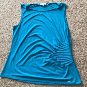 Turquoise / blue dress tank top by Calvin Klein.